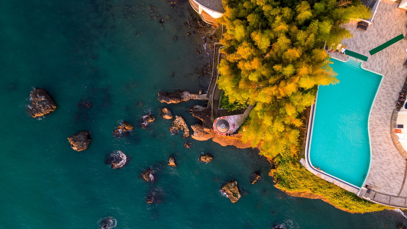 Clifftop resort pool above the ocean